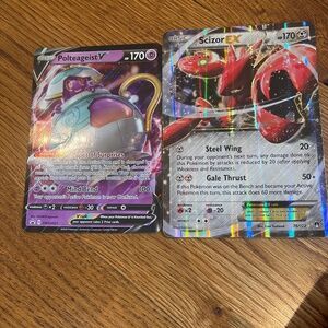 Two giant Pokémon cards